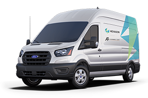 White Ford Transit with Hexagon | AutonomouStuff branding